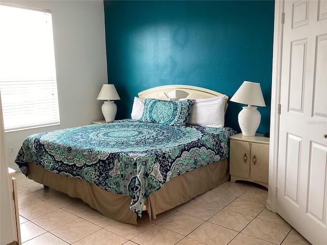 2305 Butterfly Palm Way Unit 304, Kissimmee, FL 34747 - bedroom with tile patterned flooring