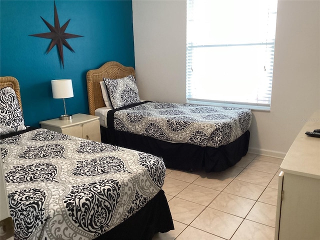 2305 Butterfly Palm Way Unit 304, Kissimmee, FL 34747 - bedroom featuring light tile patterned floors
