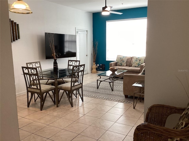 2305 Butterfly Palm Way Unit 304, Kissimmee, FL 34747 - dining space with light tile patterned flooring and a ceiling fan