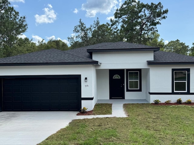 706 Marion Oaks Mnr, Ocala, FL 34473 - view of front of house featuring roof with shingles, an attached garage, a front yard, concrete driveway, and stucco siding