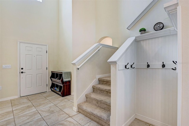 998 Sorrel St NW, Palm Bay, FL 32907 - foyer entrance featuring a high ceiling, light tile patterned floors, and baseboards