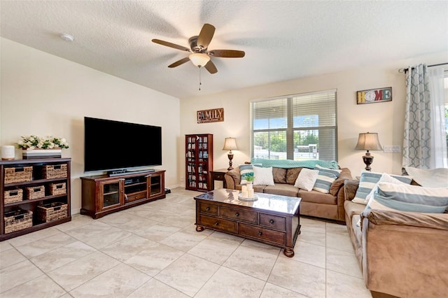 998 Sorrel St NW, Palm Bay, FL 32907 - living room with a ceiling fan, light tile patterned floors, and a textured ceiling