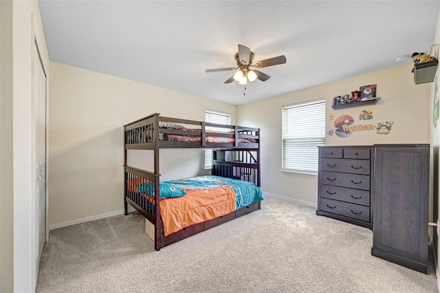 998 Sorrel St NW, Palm Bay, FL 32907 - bedroom with carpet, baseboards, and ceiling fan