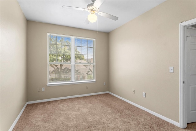1101 Vintage Village Ln Unit 101, Ocoee, FL 34761 - spare room featuring carpet flooring and a ceiling fan