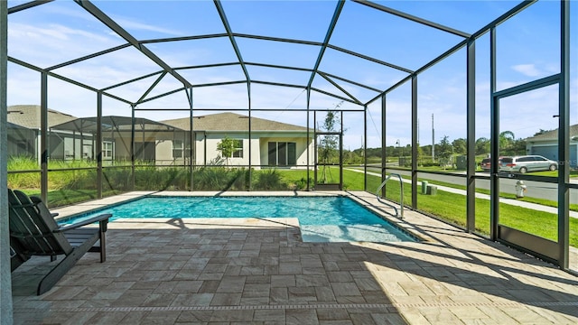 1650 Key Bay Trl, Kissimmee, FL 34747 - swimming pool featuring a lawn, a patio, and a lanai