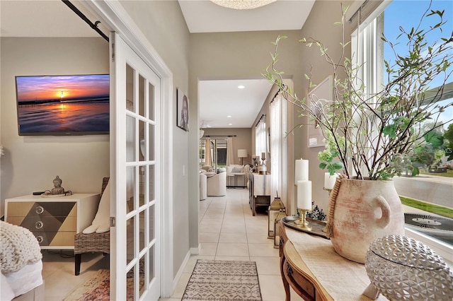 1650 Key Bay Trl, Kissimmee, FL 34747 - hall with light tile patterned flooring and recessed lighting