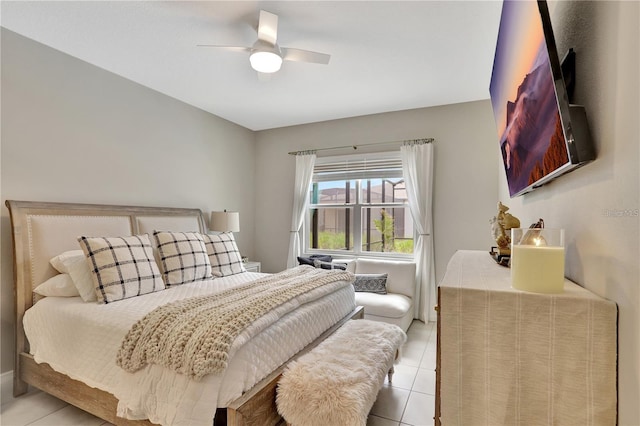1650 Key Bay Trl, Kissimmee, FL 34747 - bedroom featuring light tile patterned floors and ceiling fan