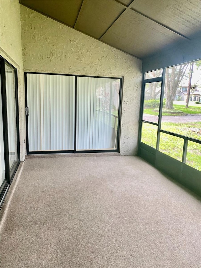 1110 Woodbine St, Fern Park, FL 32730 - unfurnished sunroom featuring vaulted ceiling
