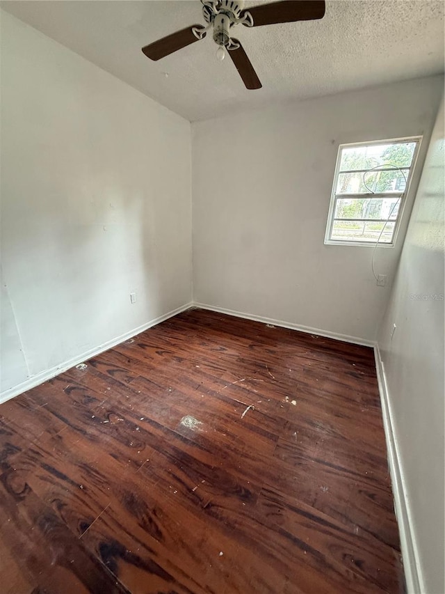 914 SW 8th Ave Unit 14, Gainesville, FL 32601 - spare room featuring hardwood / wood-style flooring, baseboards, and a ceiling fan
