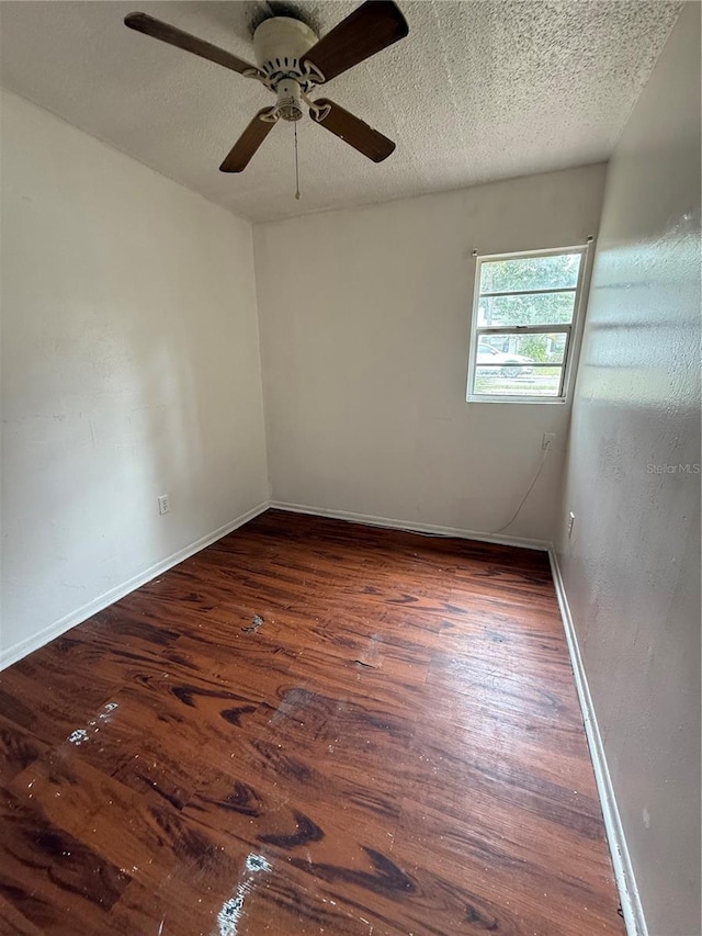 914 SW 8th Ave Unit 14, Gainesville, FL 32601 - spare room with hardwood / wood-style floors, ceiling fan, baseboards, and a textured ceiling