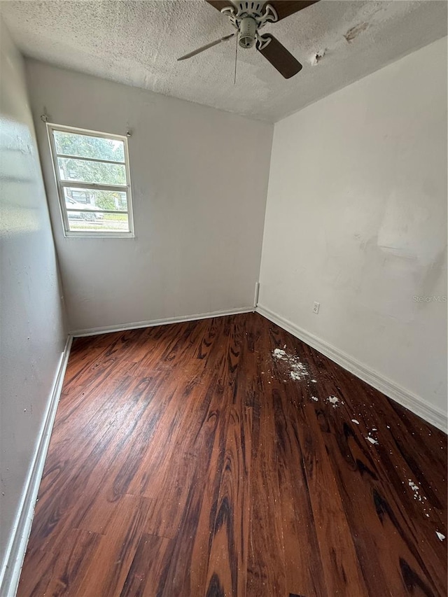 914 SW 8th Ave Unit 14, Gainesville, FL 32601 - empty room featuring wood finished floors, a textured ceiling, baseboards, and ceiling fan