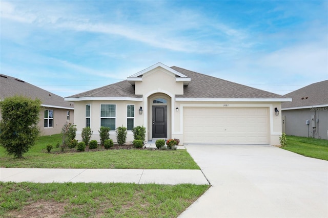 1061 Citrus Landings Blvd, Davenport, FL 33837 - ranch-style home with stucco siding, an attached garage, a front yard, and concrete driveway