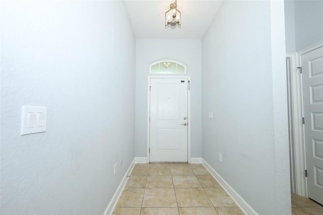 1061 Citrus Landings Blvd, Davenport, FL 33837 - entryway with light tile patterned floors and baseboards