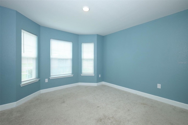 1061 Citrus Landings Blvd, Davenport, FL 33837 - unfurnished room with carpet and baseboards