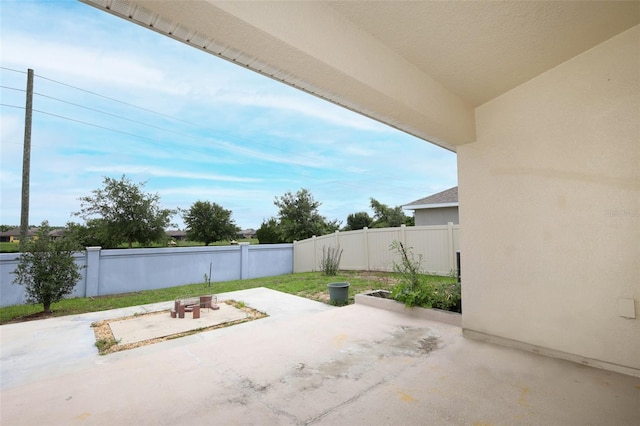 1061 Citrus Landings Blvd, Davenport, FL 33837 - fenced backyard with a patio area