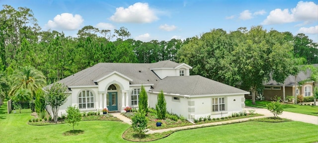 2908 Lee Shore Loop, Orlando, FL 32820 - ranch-style house with a front lawn, stucco siding, and a shingled roof