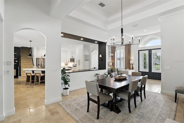 2908 Lee Shore Loop, Orlando, FL 32820 - dining space with arched walkways, stone tile floors, a chandelier, recessed lighting, and baseboards