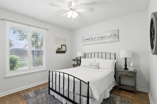 2908 Lee Shore Loop, Orlando, FL 32820 - bedroom with wood finished floors, baseboards, and a ceiling fan
