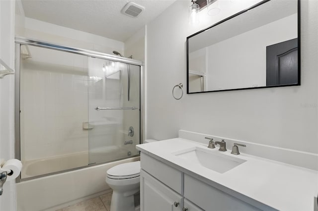 2908 Lee Shore Loop, Orlando, FL 32820 - full bathroom featuring toilet, vanity, bath / shower combo with glass door, and tile patterned floors