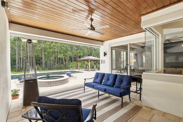 2908 Lee Shore Loop, Orlando, FL 32820 - view of patio / terrace featuring a ceiling fan, an in-ground hot tub, an outdoor living space, and an outdoor pool