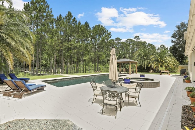 2908 Lee Shore Loop, Orlando, FL 32820 - view of patio featuring a gazebo and an in-ground hot tub