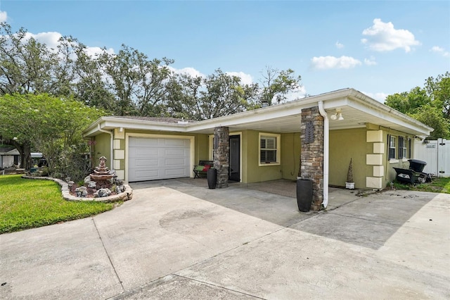 3312 SE 6th St, Ocala, FL 34471 - mid-century modern home featuring stucco siding, driveway, a garage, and stone siding