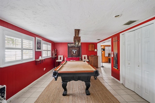 3312 SE 6th St, Ocala, FL 34471 - playroom featuring light tile patterned flooring, billiards, a textured ceiling, wood walls, and crown molding