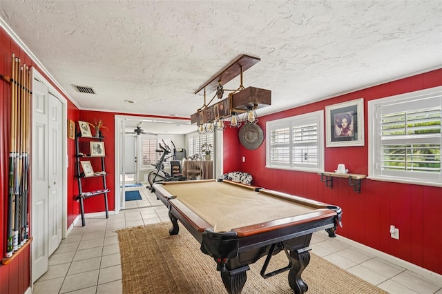3312 SE 6th St, Ocala, FL 34471 - rec room with healthy amount of natural light, light tile patterned floors, a textured ceiling, pool table, and a ceiling fan