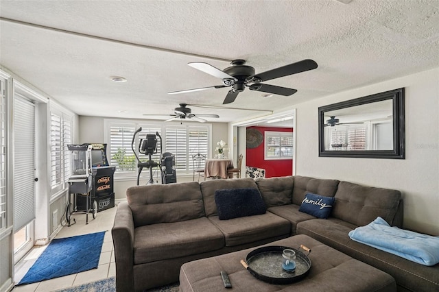 3312 SE 6th St, Ocala, FL 34471 - tiled living area featuring ceiling fan and a textured ceiling