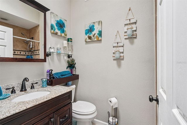 3312 SE 6th St, Ocala, FL 34471 - bathroom featuring toilet, vanity, and tiled shower