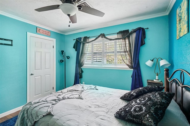 3312 SE 6th St, Ocala, FL 34471 - bedroom featuring ornamental molding, wood finished floors, ceiling fan, and baseboards