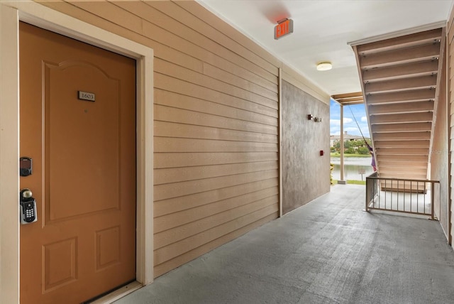 6451 Borasco Dr Unit 1603, Melbourne, FL 32940 - view of exterior entry with a water view
