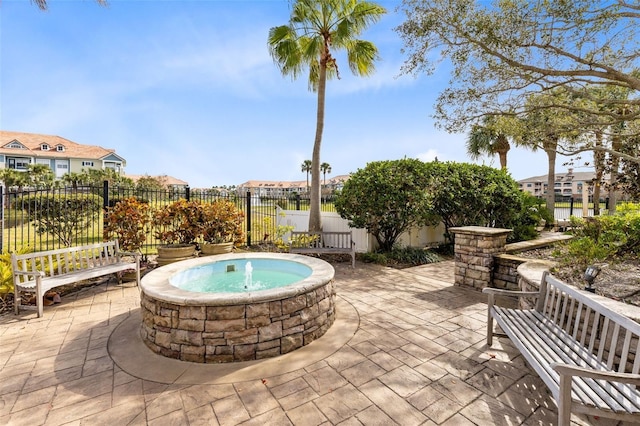 6451 Borasco Dr Unit 1603, Melbourne, FL 32940 - view of patio with an outdoor hot tub