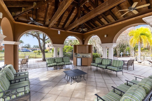 6451 Borasco Dr Unit 1603, Melbourne, FL 32940 - view of patio featuring ceiling fan, an outdoor hangout area, and exterior kitchen