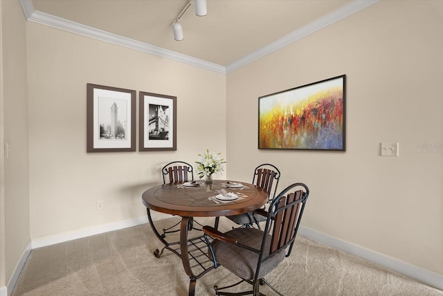 6451 Borasco Dr Unit 1603, Melbourne, FL 32940 - carpeted dining room featuring ornamental molding and track lighting