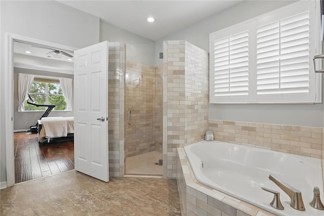 405 Courtlea Park Dr, Winter Garden, FL 34787 - ensuite bathroom featuring a garden tub, a shower stall, recessed lighting, and vaulted ceiling