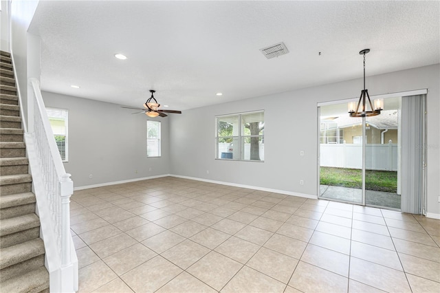 809 Kazaros Cir, Ocoee, FL 34761 - empty room featuring light tile patterned floors, stairs, ceiling fan, baseboards, and recessed lighting