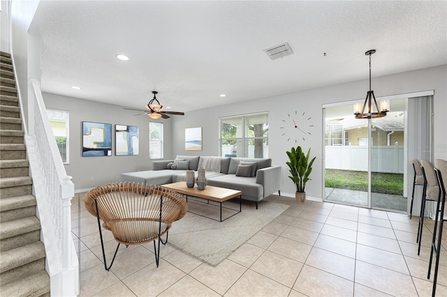 809 Kazaros Cir, Ocoee, FL 34761 - living area with stairs, light tile patterned floors, plenty of natural light, recessed lighting, and a textured ceiling