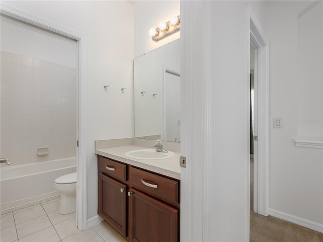 809 Kazaros Cir, Ocoee, FL 34761 - full bath with vanity, toilet, tile patterned flooring, baseboards, and tub / shower combination