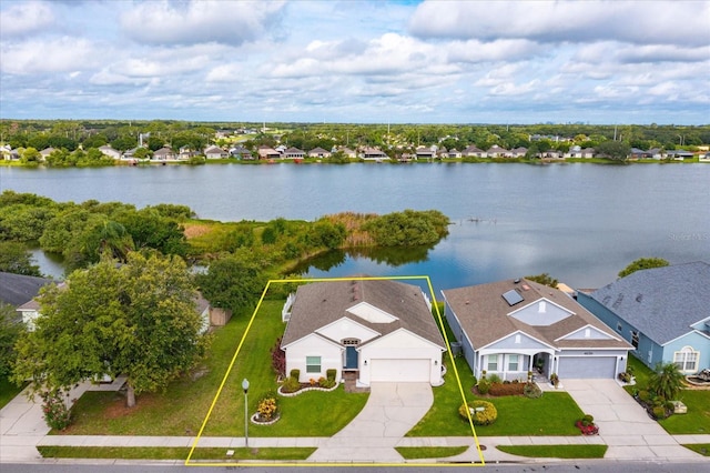 4642 Waterside Pointe Cir, Orlando, FL 32829 - aerial perspective of suburban area with property boundaries highlighted and a nearby body of water