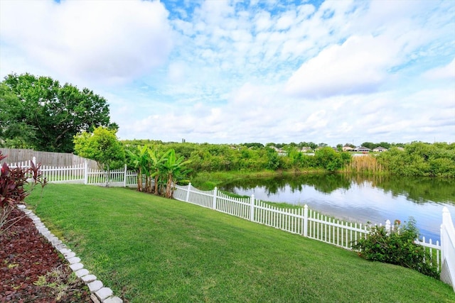 4642 Waterside Pointe Cir, Orlando, FL 32829 - view of yard with a water view