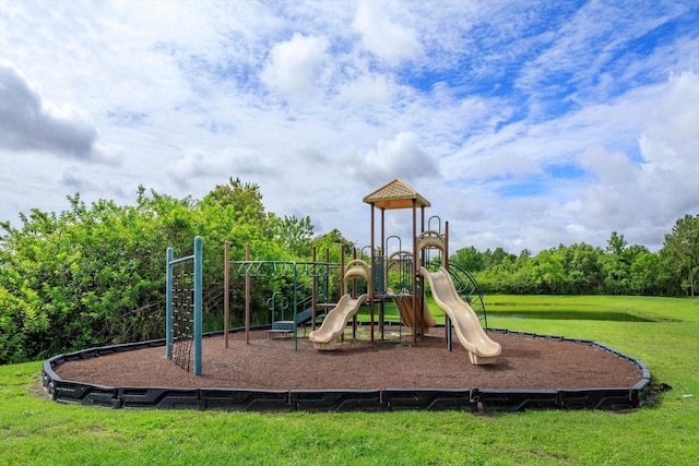 4642 Waterside Pointe Cir, Orlando, FL 32829 - community playground featuring a lawn