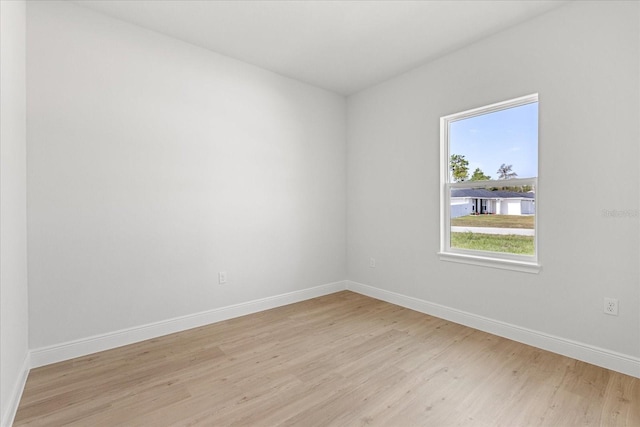 14915 SW 39th Cir, Ocala, FL 34473 - unfurnished room featuring light wood finished floors and baseboards