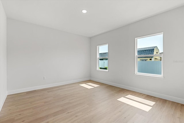 14915 SW 39th Cir, Ocala, FL 34473 - spare room with light wood-style floors, baseboards, and recessed lighting