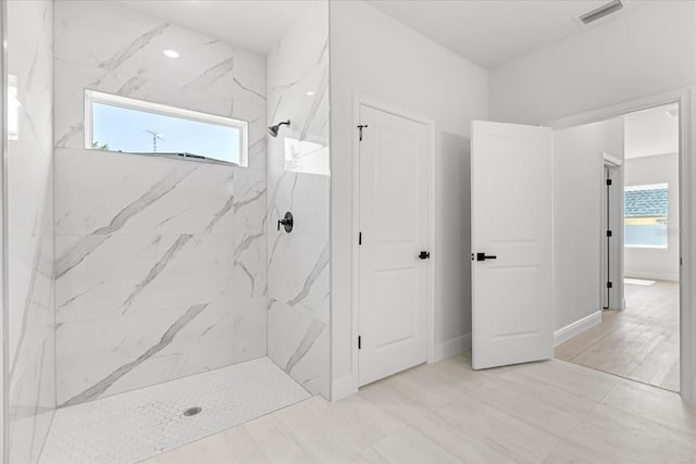 14915 SW 39th Cir, Ocala, FL 34473 - full bath with a marble finish shower and plenty of natural light