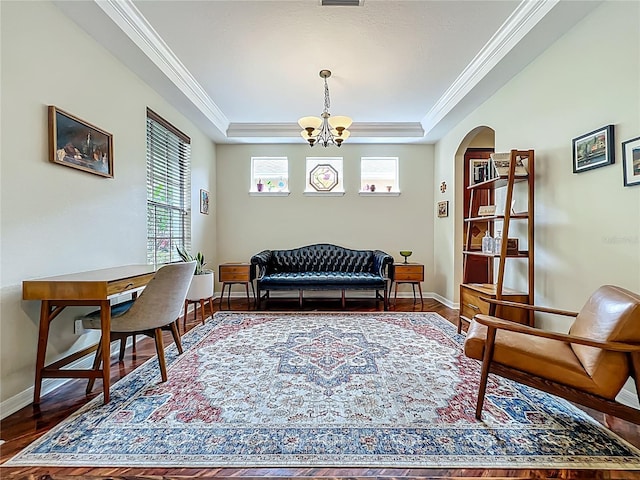 12641 Arley Dr, Windermere, FL 34786 - living area with healthy amount of natural light, a chandelier, wood finished floors, a raised ceiling, and ornamental molding