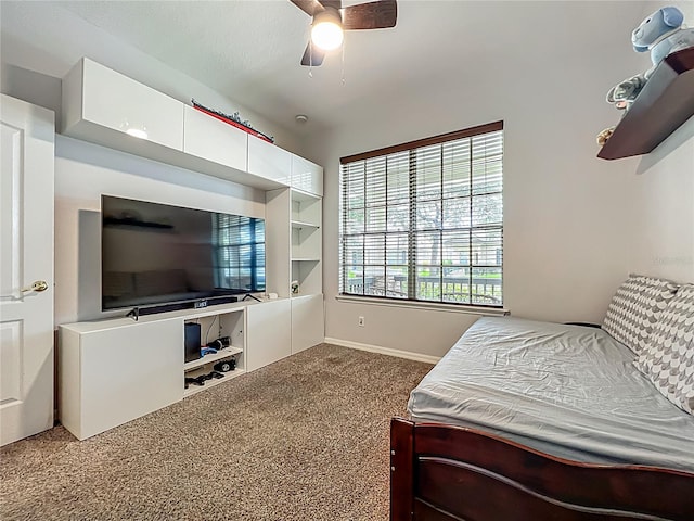 12641 Arley Dr, Windermere, FL 34786 - bedroom with carpet, baseboards, and ceiling fan