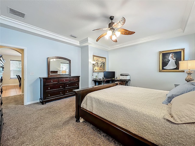12641 Arley Dr, Windermere, FL 34786 - bedroom featuring carpet floors, an office area, a ceiling fan, a tray ceiling, and crown molding