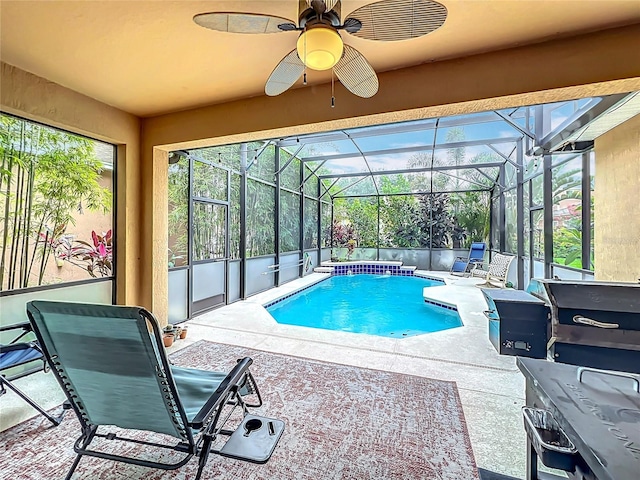 12641 Arley Dr, Windermere, FL 34786 - outdoor pool with a patio, ceiling fan, and glass enclosure