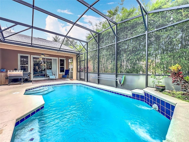 12641 Arley Dr, Windermere, FL 34786 - swimming pool featuring a ceiling fan, a patio, and glass enclosure